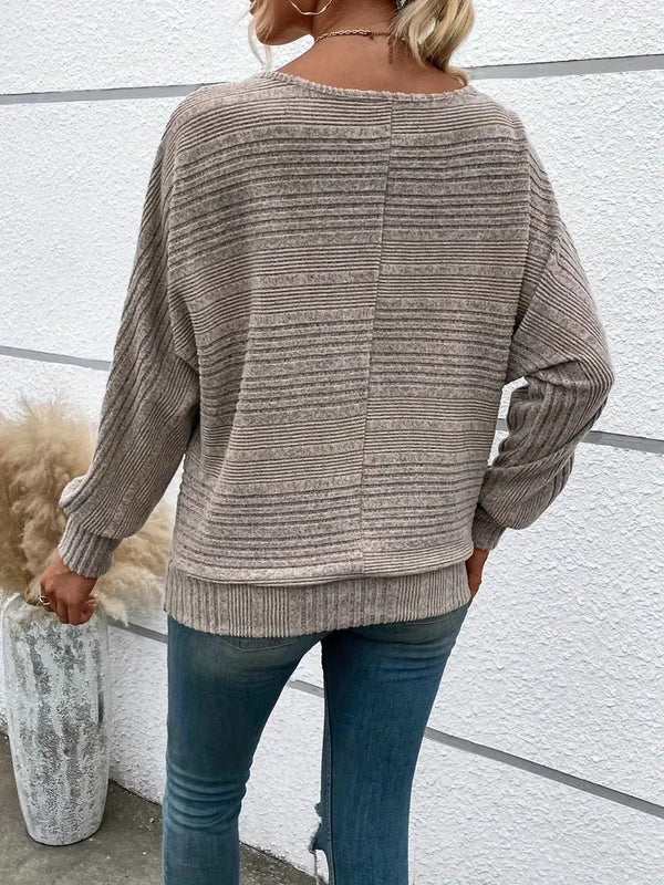Våd - ensfarvet sweater med brede ærmer til kvinder