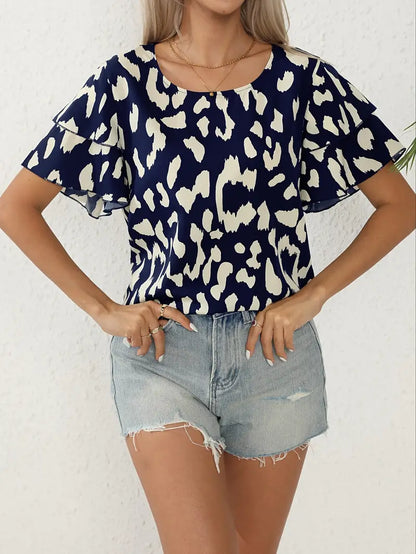 Evelyn – afslappet bluse med rund hals og all-over print