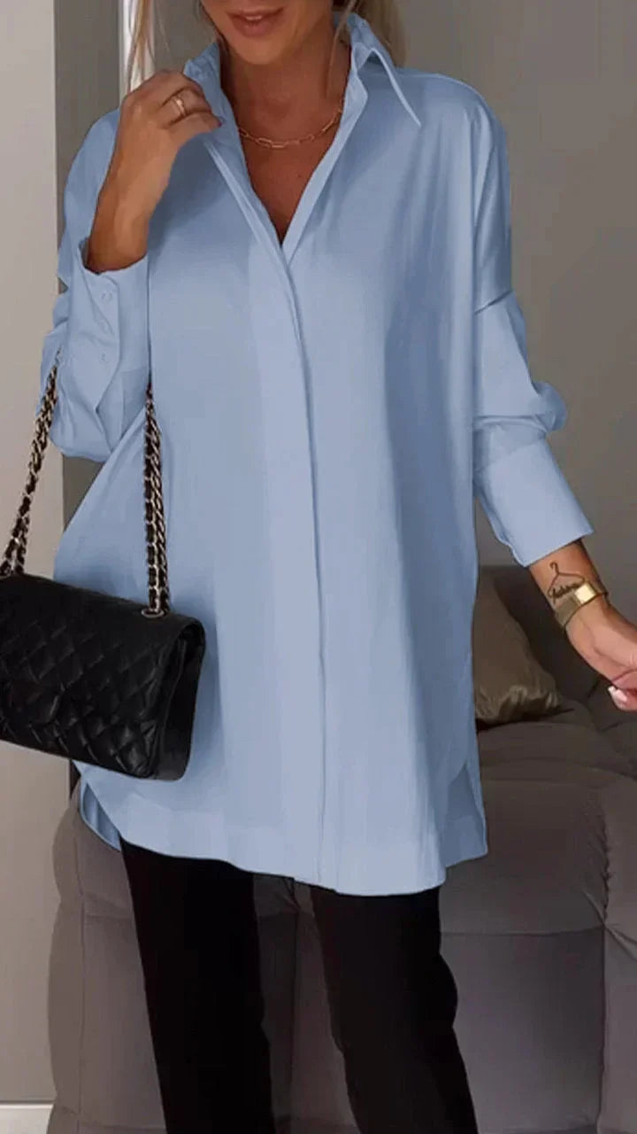 Elegant oversize skjortebluse med rullede ærmer