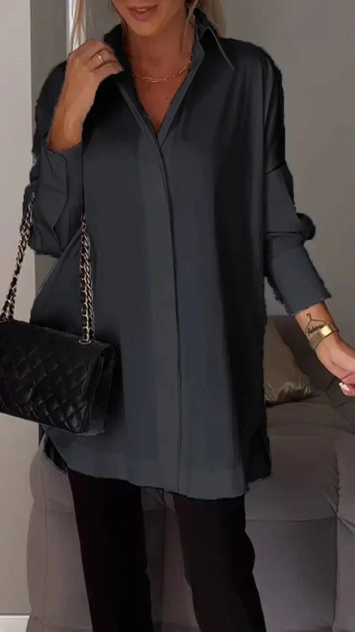 Elegant oversize skjortebluse med rullede ærmer