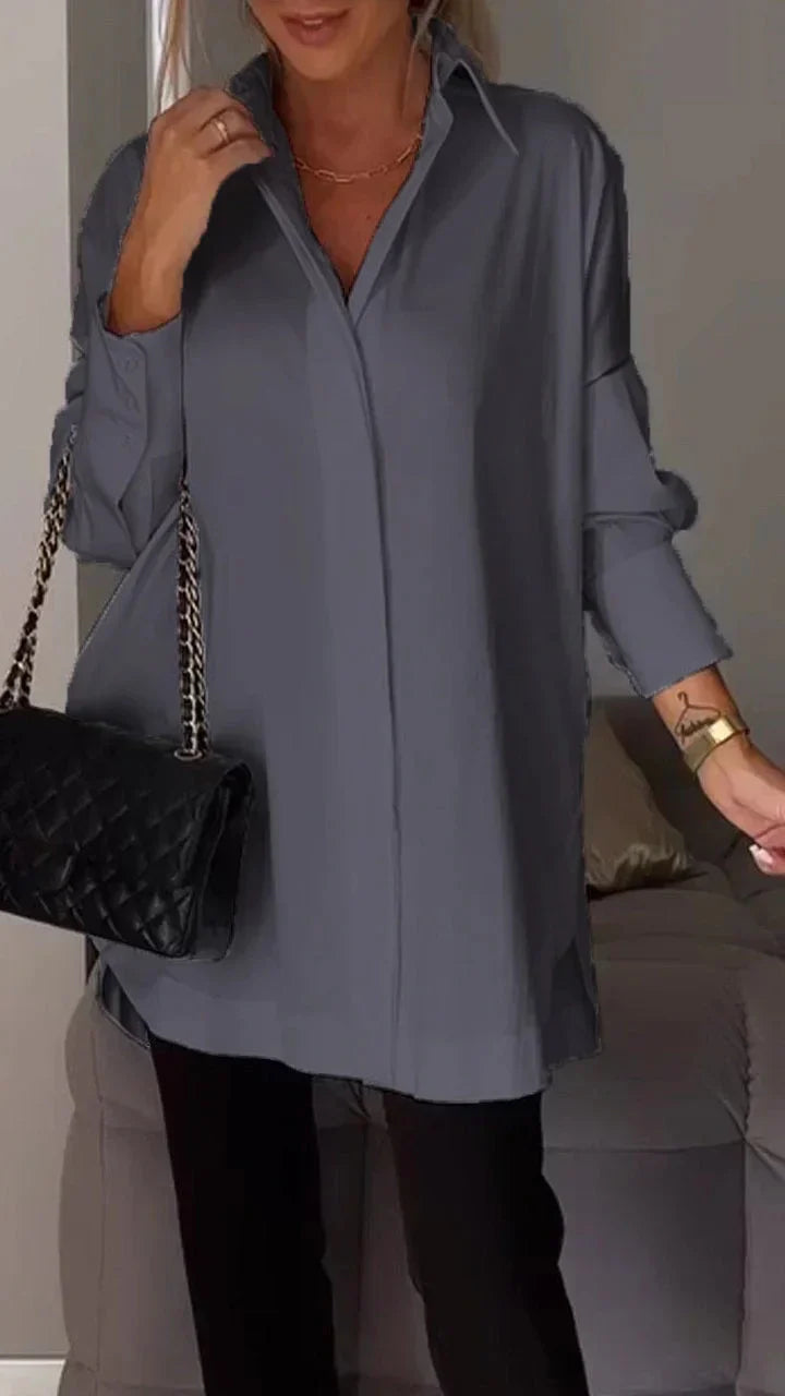 Elegant oversize skjortebluse med rullede ærmer
