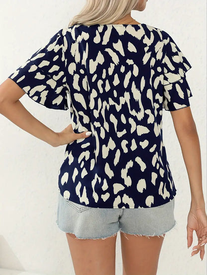 Evelyn – afslappet bluse med rund hals og all-over print