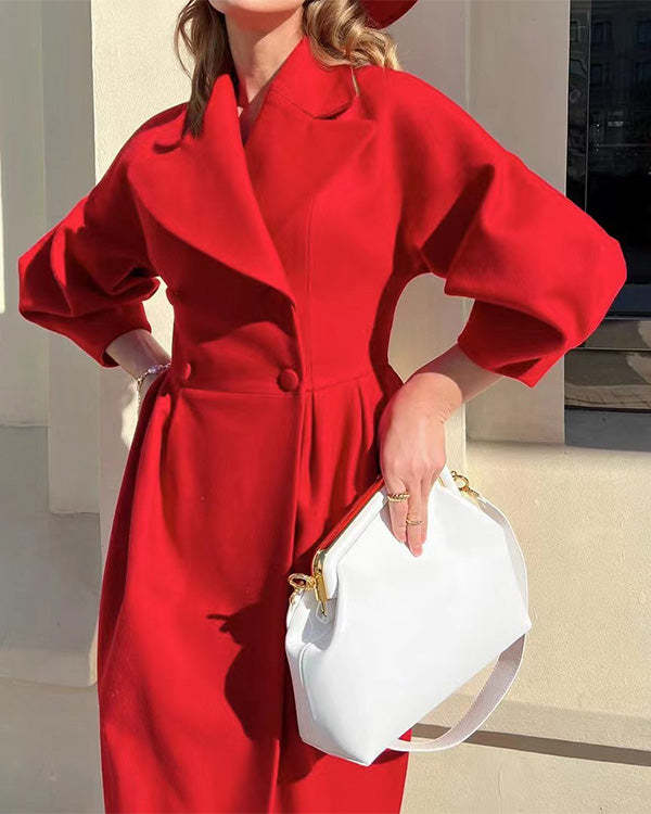 Retroluxe vintage uldfrakke med lanterneærmer og revers