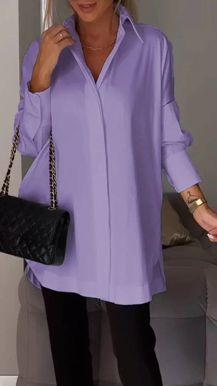 Elegant oversize skjortebluse med rullede ærmer
