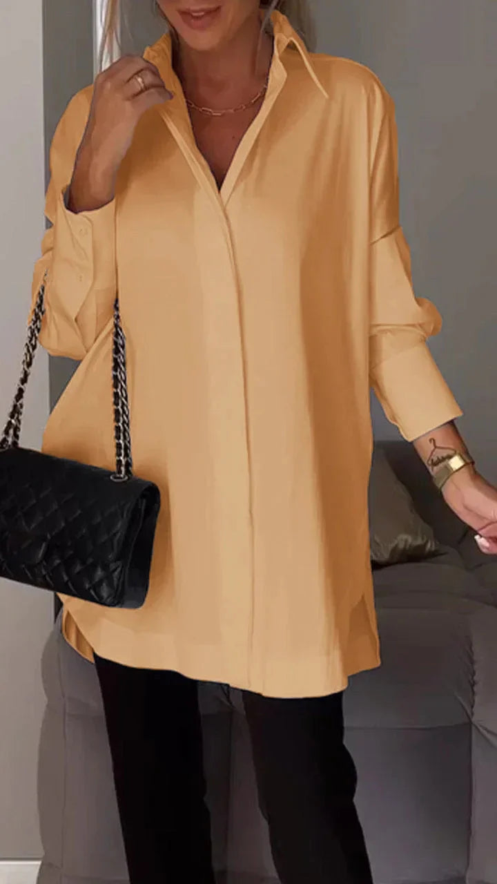 Elegant oversize skjortebluse med rullede ærmer
