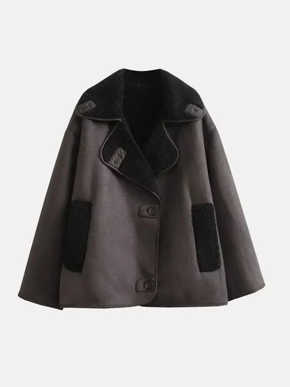 Oversized damefrakke i læder med pels