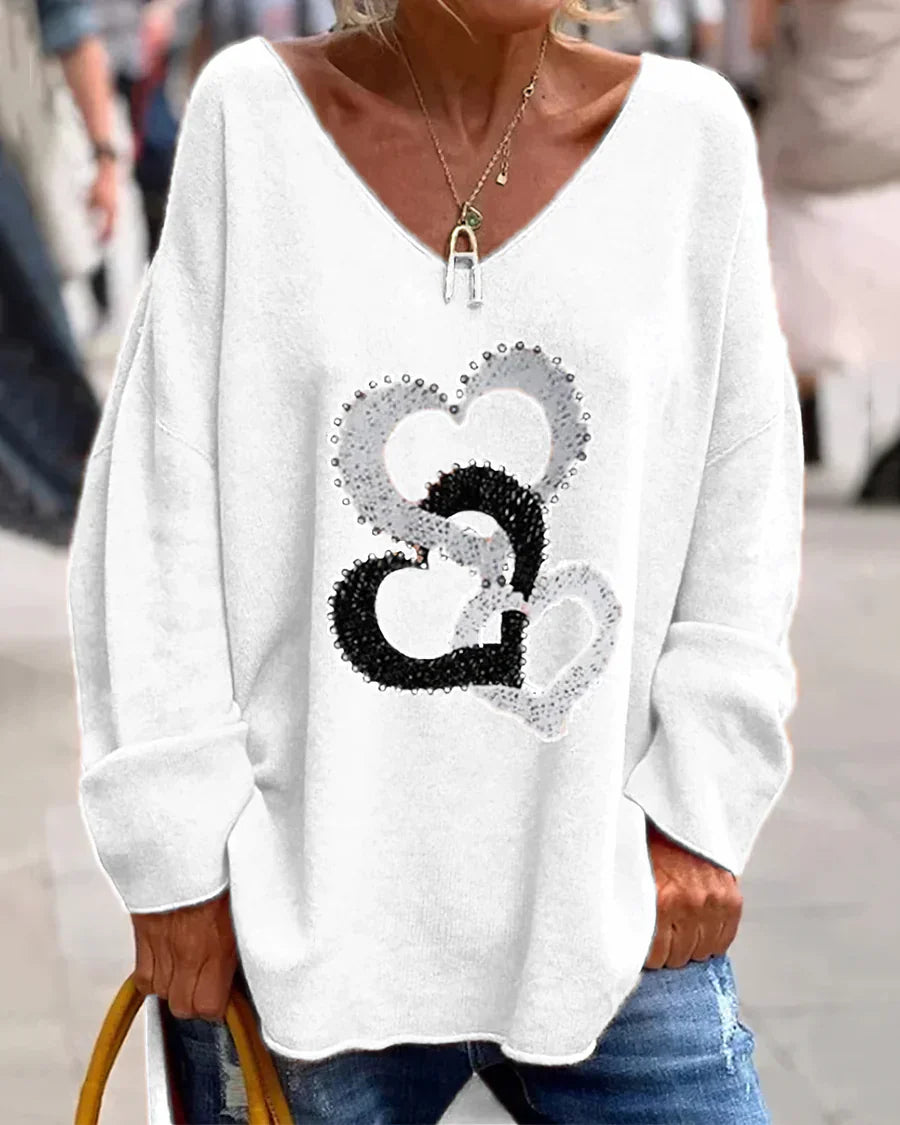 Flosa - behagelig grafisk sweater til kvinder