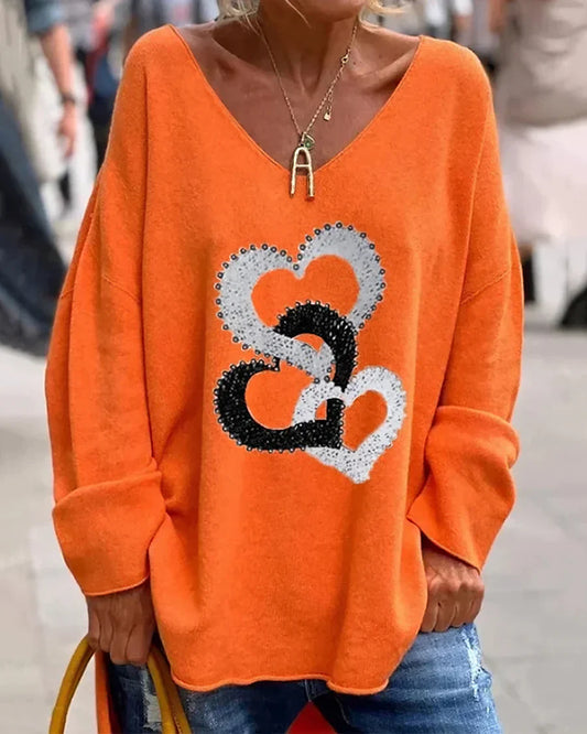 Flosa - behagelig grafisk sweater til kvinder