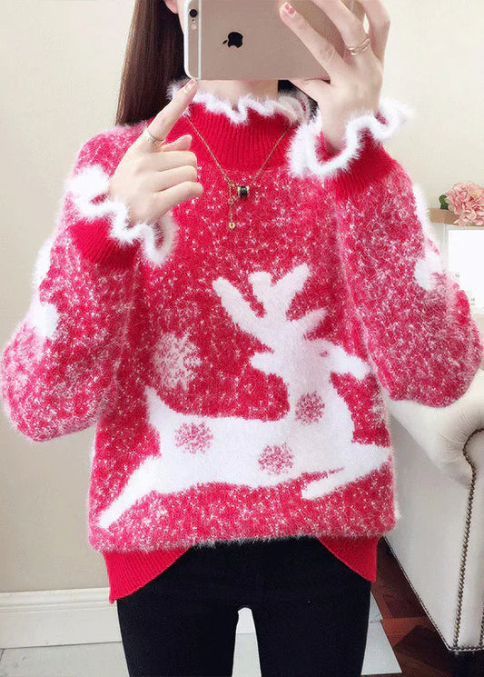 Yaretzi – afslappet sweater med flæser og tykt minkhårbroderi