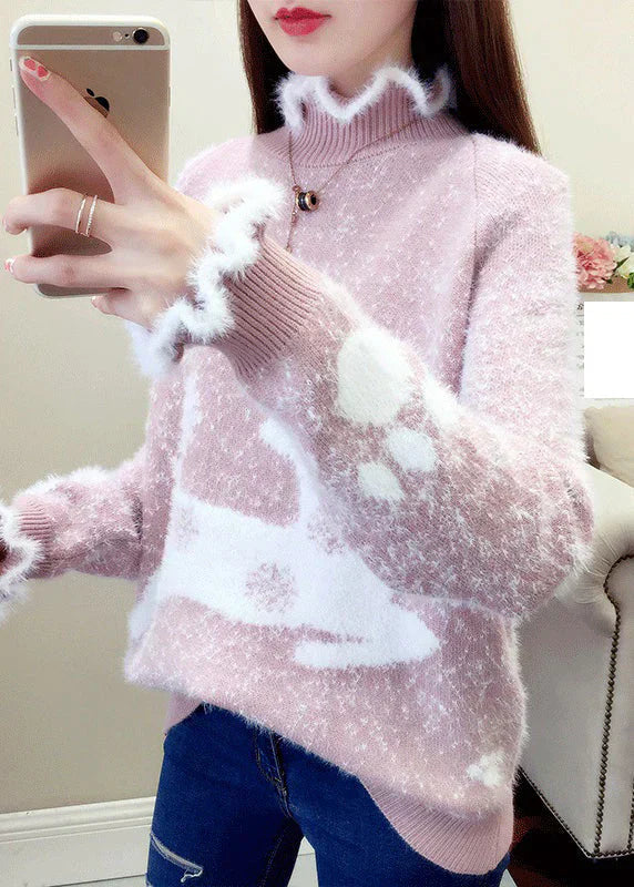 Yaretzi – afslappet sweater med flæser og tykt minkhårbroderi