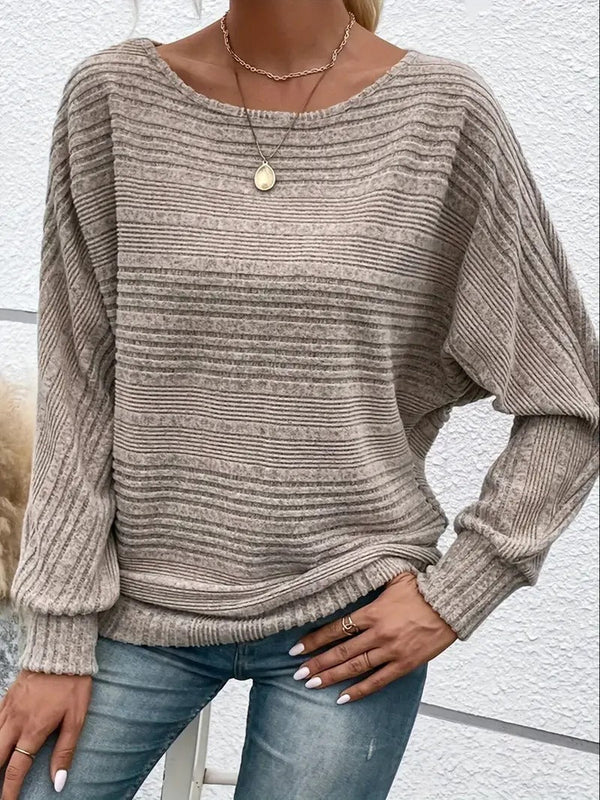 Våd - ensfarvet sweater med brede ærmer til kvinder