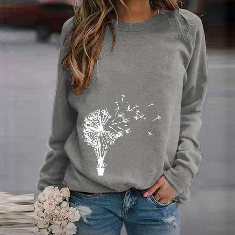 Mælkebøtte – moderigtig sweater med rund hals