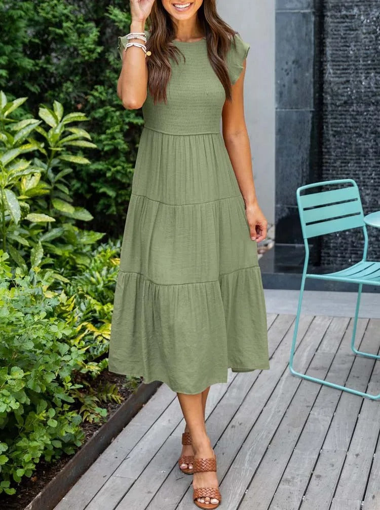 Elegant sommerkjole - flæsedetaljer, lommer