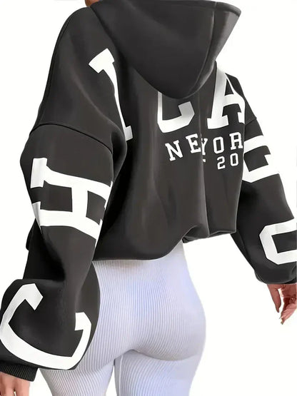 Oversized sweater med lange ærmer og tekstlogo på ærmet