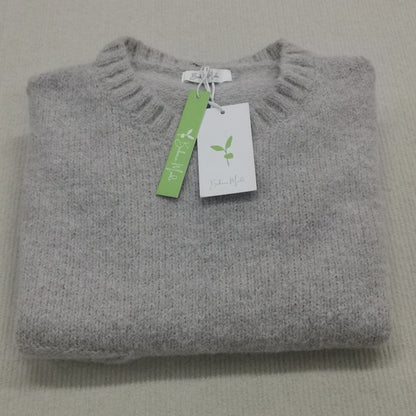 Oversized sweater med elfenbensfarvet frontlomme og store dybe lommer til kvinder