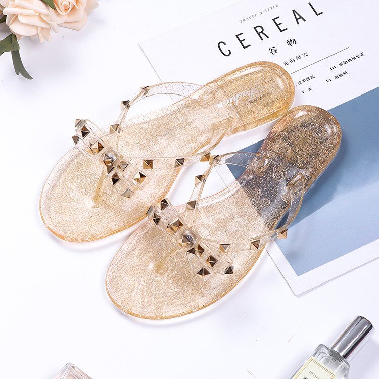 Flip-flops-sandaler med nitter